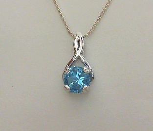 Blue Lone Star Cut topaz in sterling silver Ribbon pendant