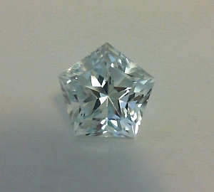 Pentagon shape natural topaz with Lone Star Cut pavilion and table