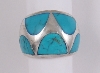 Matching turquoise cut to fit and installed in silver ring