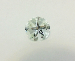 Light green amethyst or prasiolite cut in Lone Star Cut